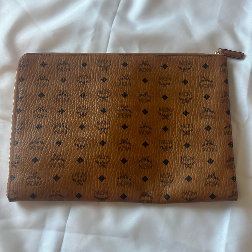 this medium zip pouch stands tall with a flat base.